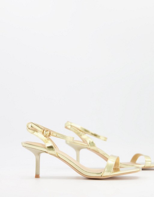 Glamorous heeled sandals with ankle strap in gold