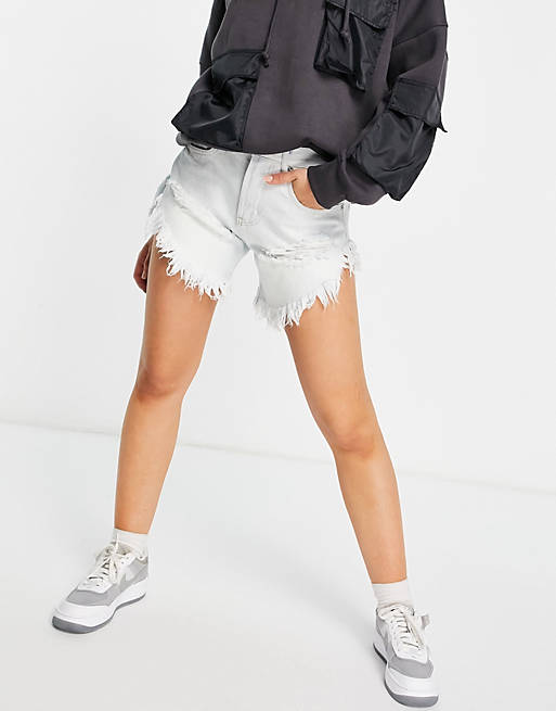 Glamorous high waisted denim shorts with distressing detail