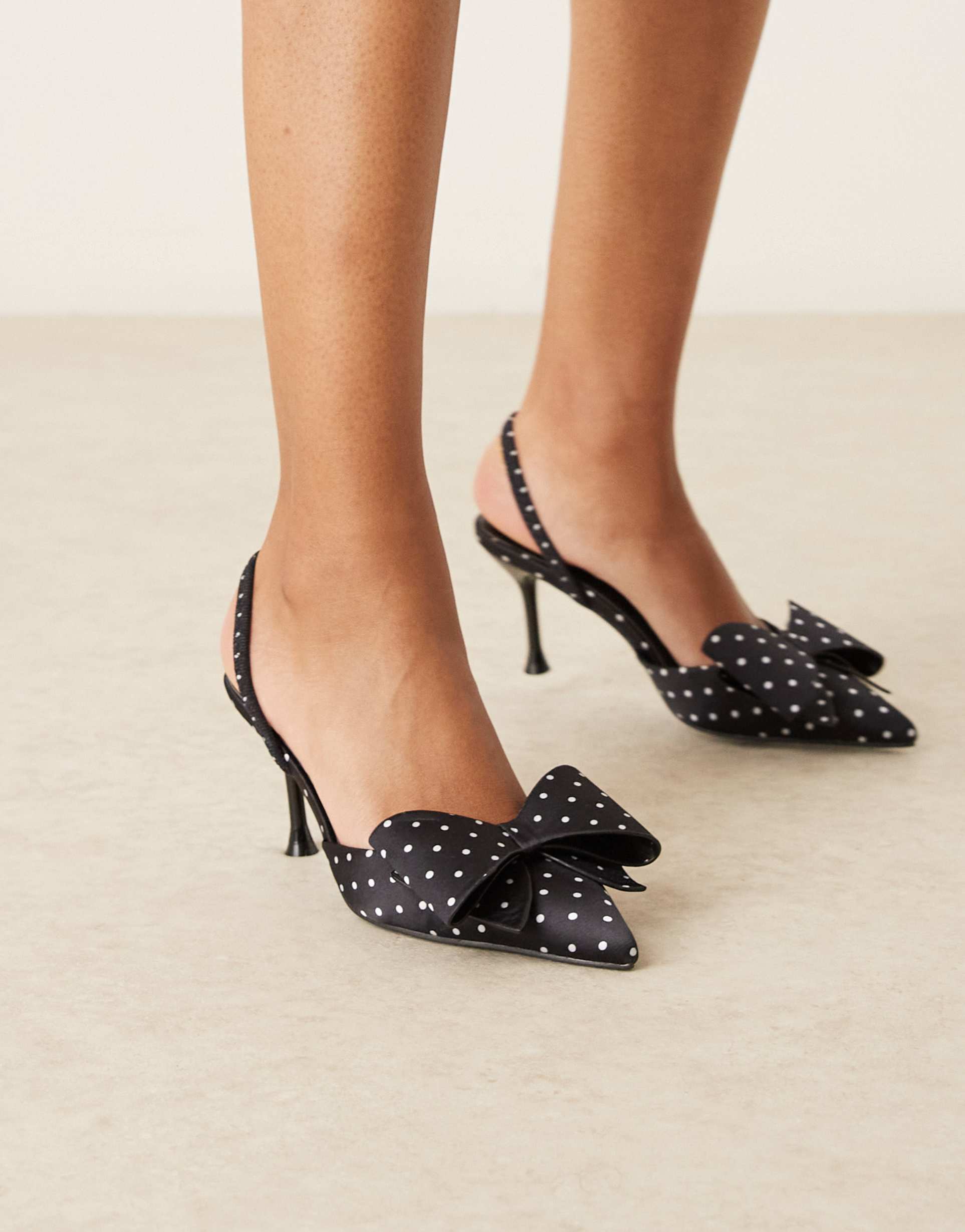 glamorous kitten heel mules in black and white polka dot