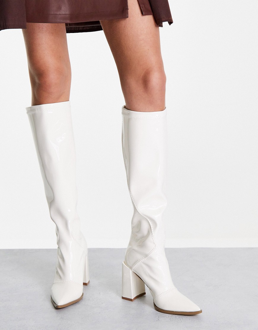 Glamorous knee-high heeled boots in white stretch patent