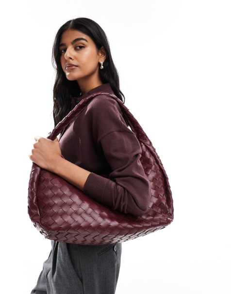 Glamorous large woven shoulder tote bag in deep burgundy - view 1