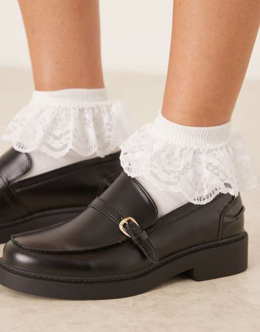 Glamorous loafers with buckle details in black