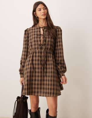 glamorous long sleeve mini smock dress with front ties in pink brown plaid