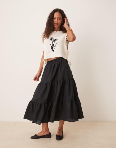 Glamorous midi skirts in black