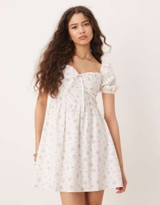 milkmaid puff sleeve mini dress in pink ditsy floral