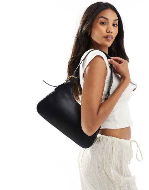 Glamorous minimal shoulder bag with buckle strap in black - view 1