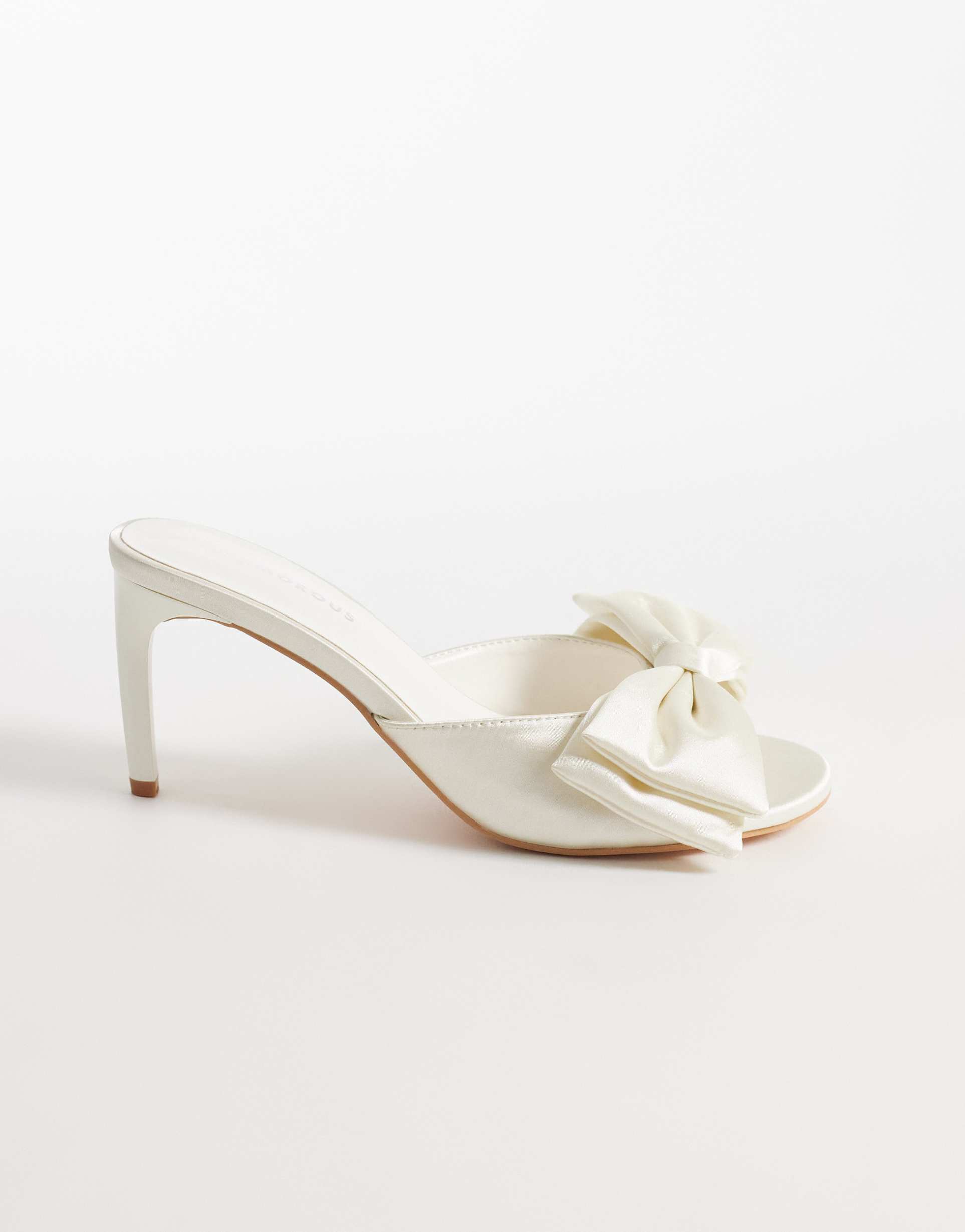 glamorous mule sandals with bow detailing in ivory satin