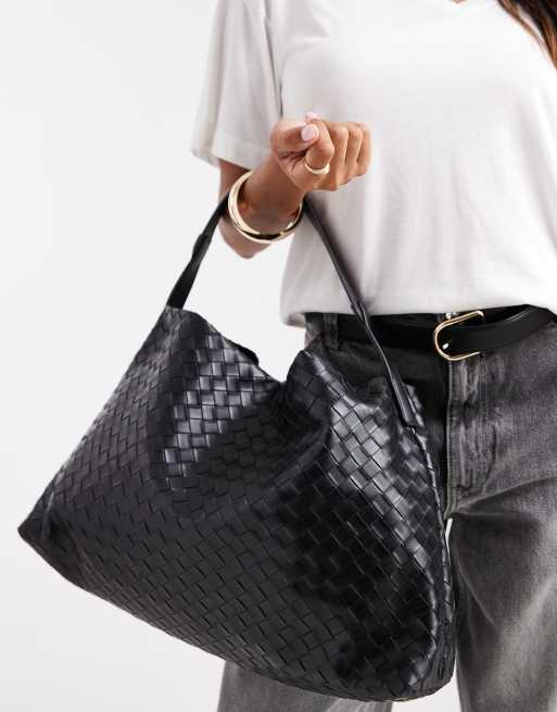 Glamorous oversized woven shoulder bag in black