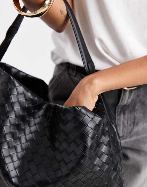 Glamorous oversized woven shoulder bag in black