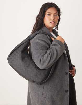 oversized woven shoulder bag in matte black