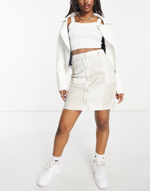 Glamorous – Patchwork-Rock aus PU in Creme