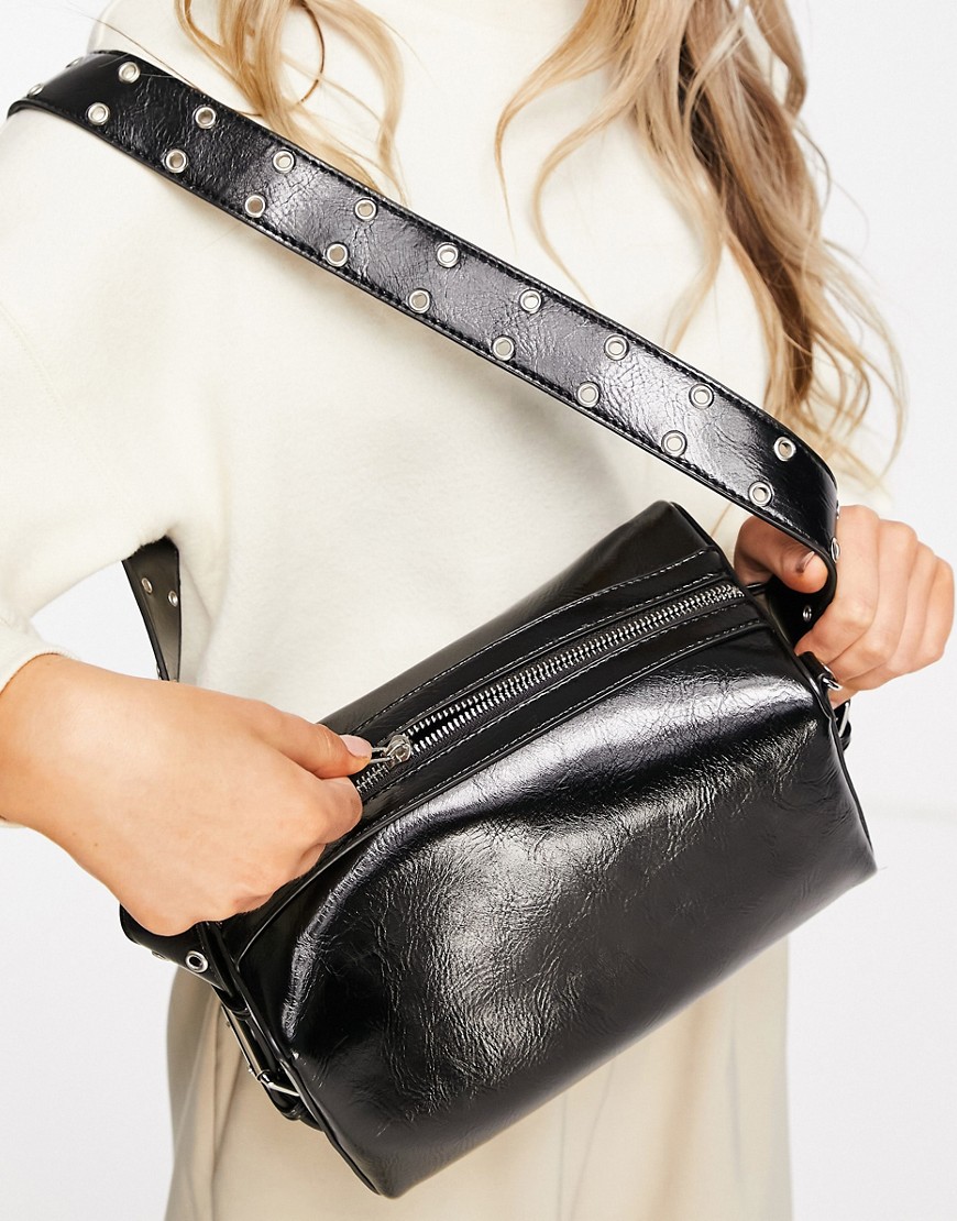 Glamorous patent boxy bag with studded strap in black