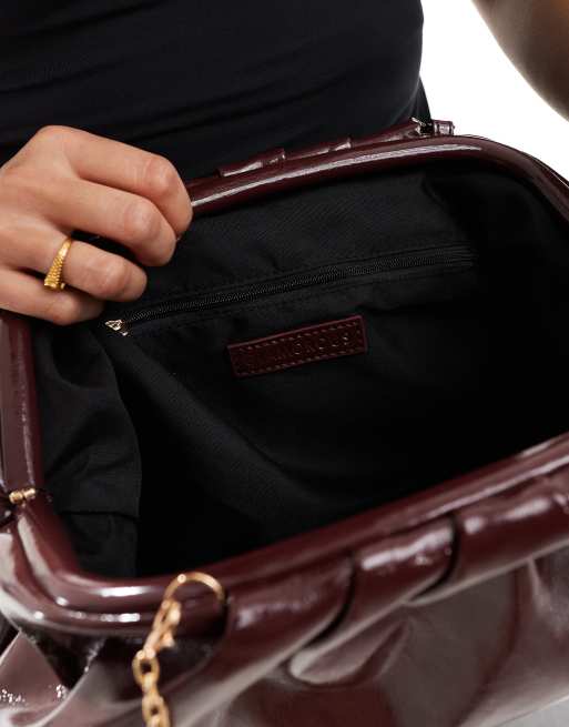 Glamorous pillow clutch bag in deep burgundy