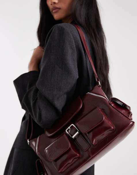 Glamorous pocket detail shoulder bag in burgundy - view 1