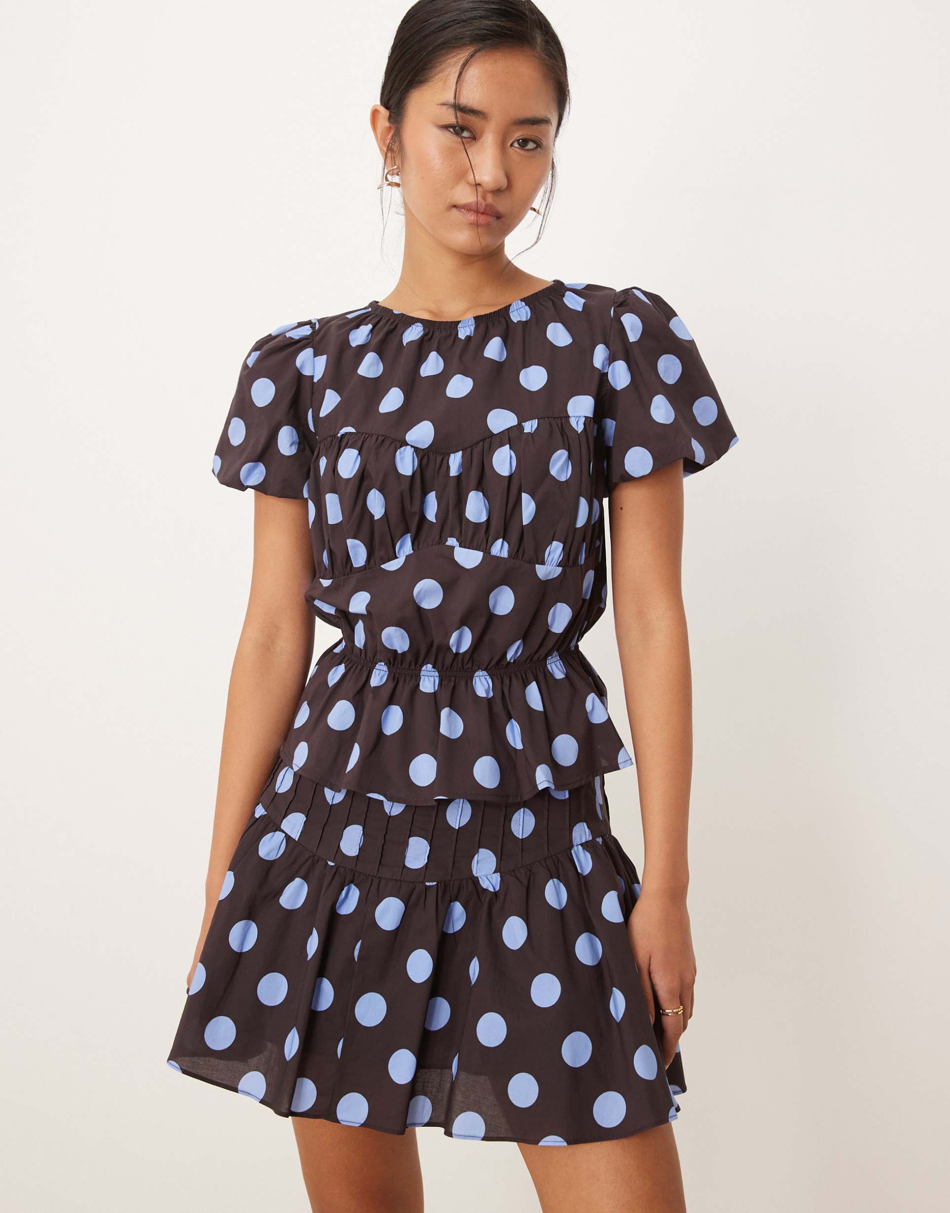 glamorous puff sleeve blouse with ruffle detailing in brown blue polka dot - part of a set