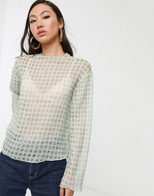 Glamorous relaxed top in sheer mini check