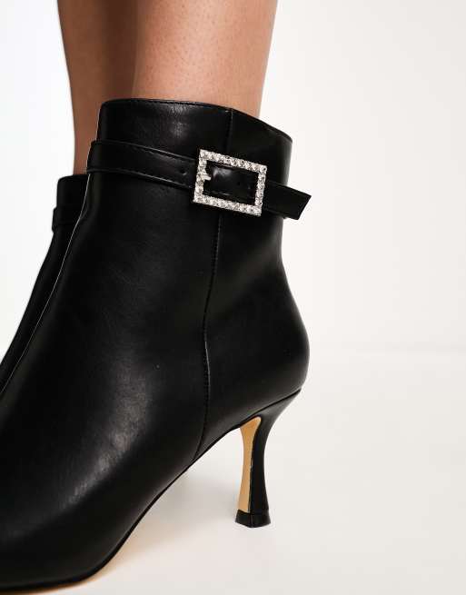 Black heeled hotsell boots with buckles