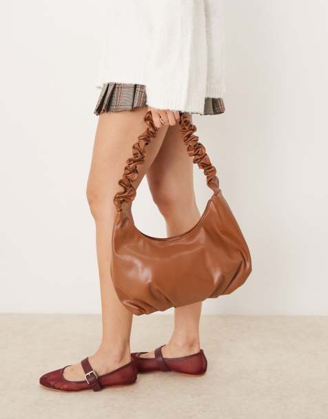 Glamorous rouched top handle bag in tan - view 1