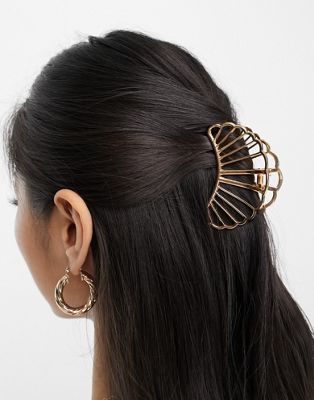 Glamorous shell hair claw in gold