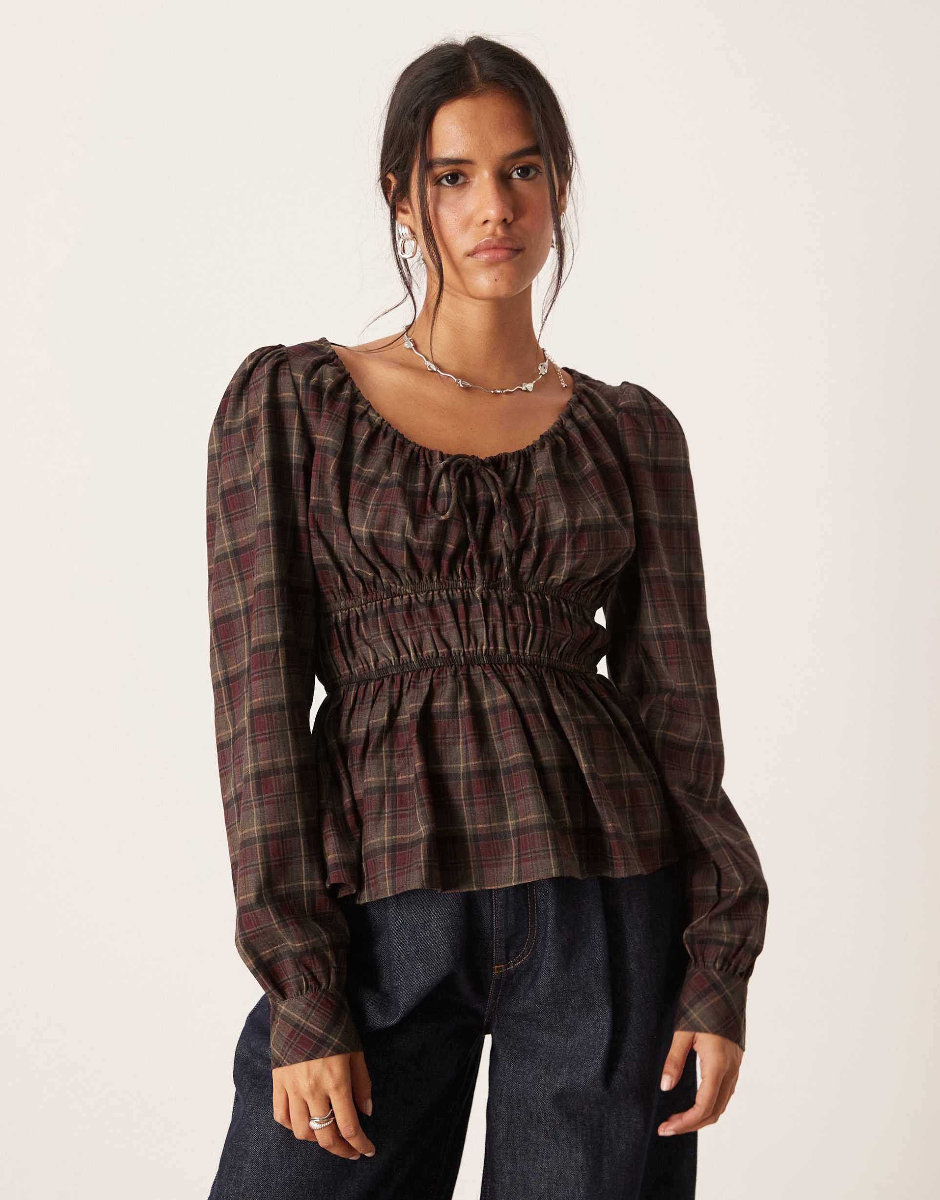 glamorous shirred peplum top in red navy plaid
