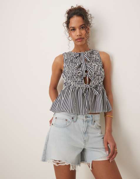 Glamorous shirred top with peplum and front bows in navy white stripe - view 1