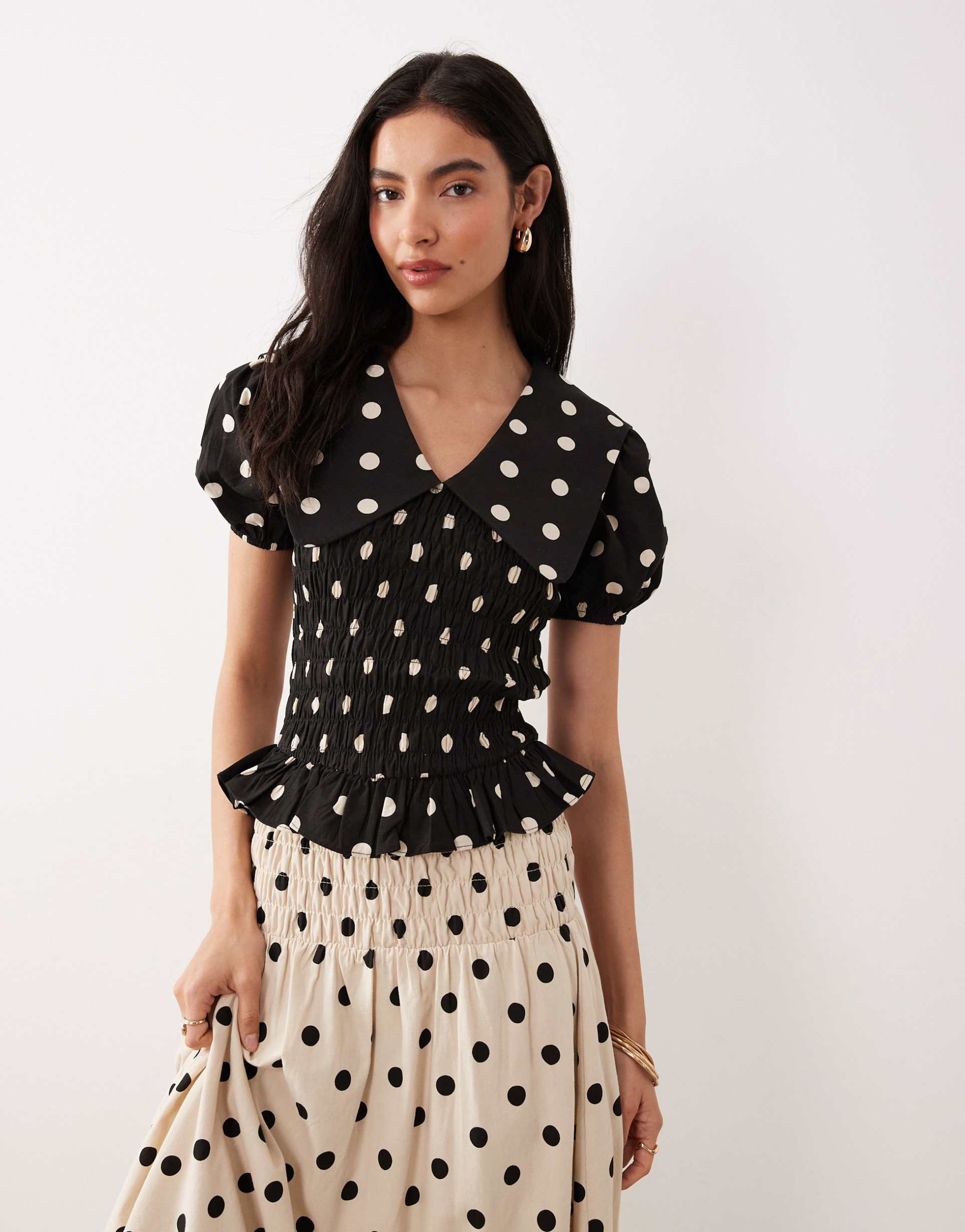 glamorous shirred top with puff sleeves and collar in black polka dots - part of a set