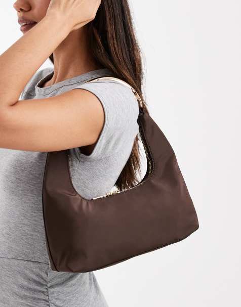 Glamorous shoulder bag with gold metal handle in dark brown - view 1