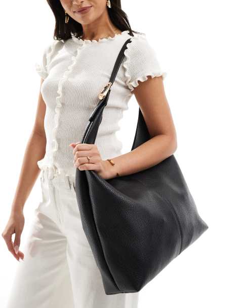 Glamorous slouch shoulder tote bag with molten buckle detail in black - view 1