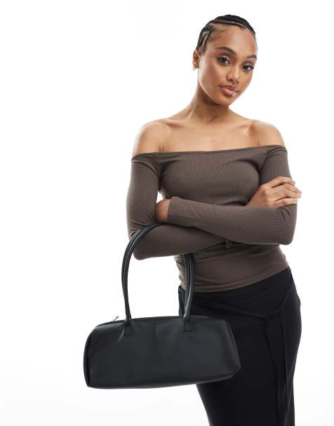 Glamorous slouchy long shoulder bag in black - view 1