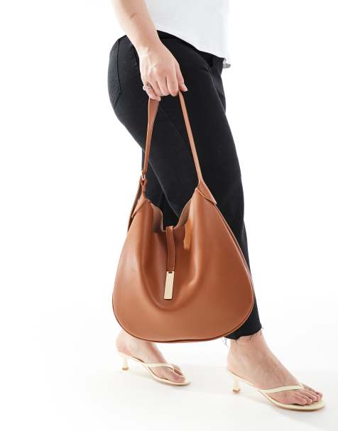 Glamorous slouchy shoulder bag with clasp detail in tan - view 1