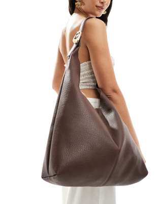 slouchy shoulder tote bag with molten buckle detail in brown