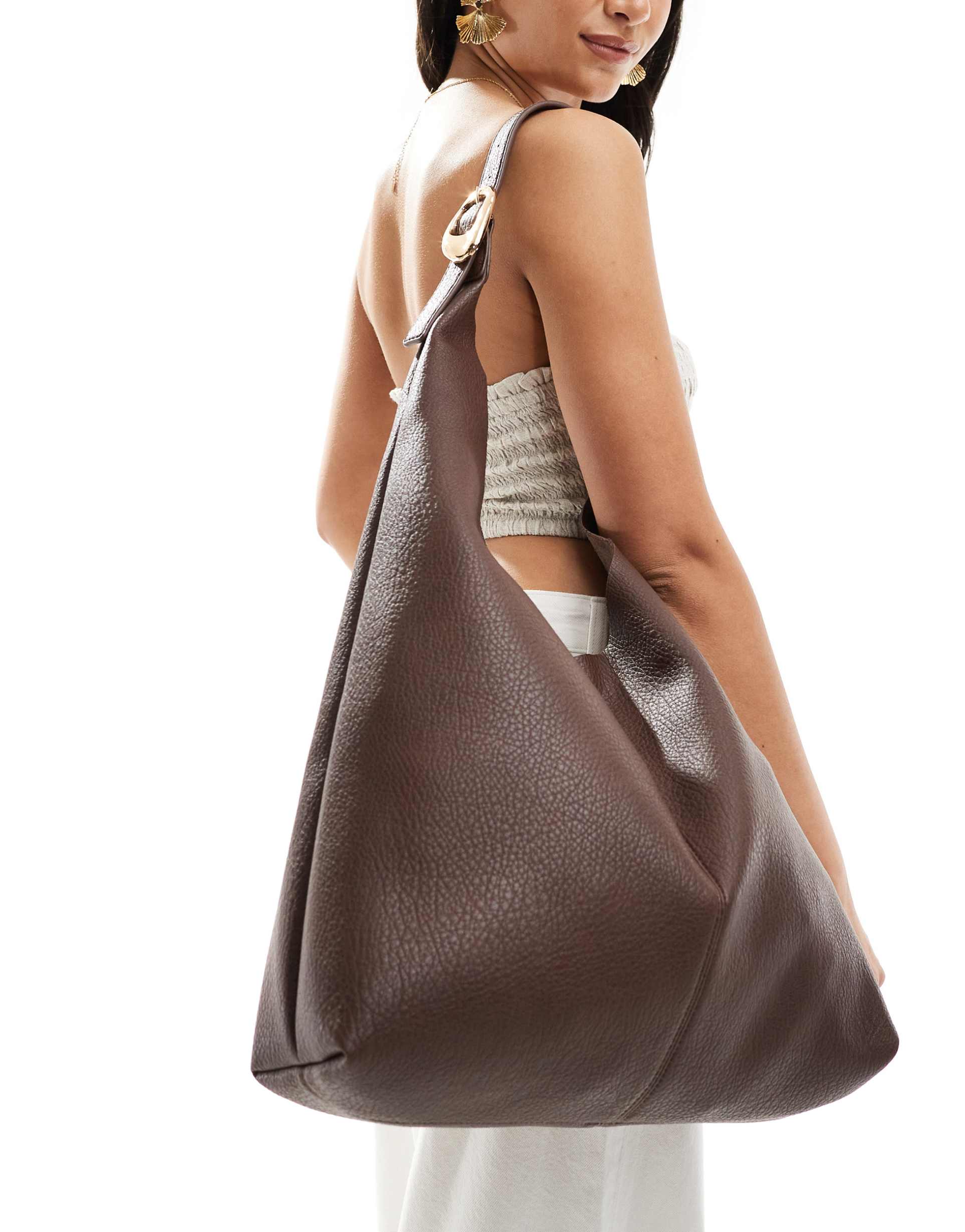 glamorous slouchy shoulder tote bag with molten buckle detail in brown