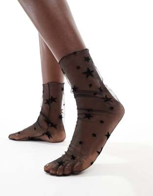 Glamorous - Socken aus Netzstoff in Schwarz mit Sternenprint