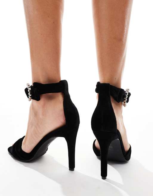 Glamorous stiletto heeled sandals with embellished buckle in black velvet ASOS