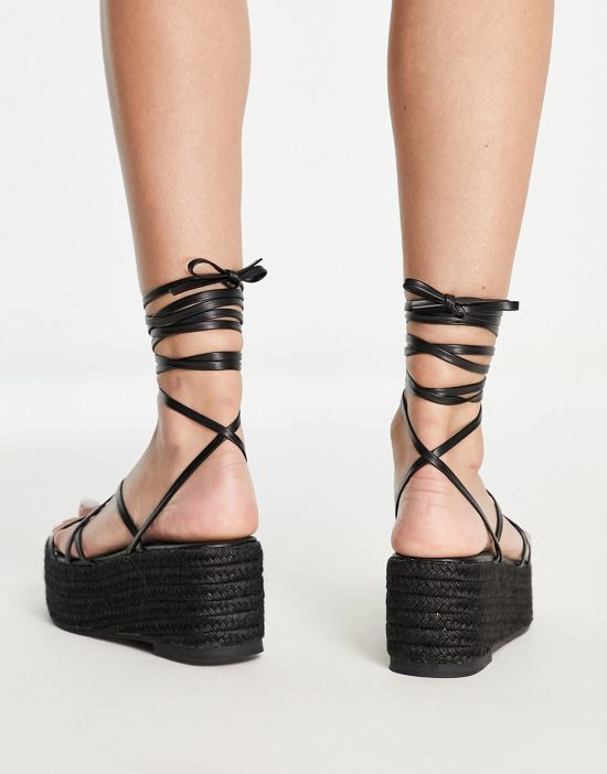 https://images.asos-media.com/products/glamorous-strappy-espadrille-flatform-in-black/201573713-2?$n_550w$&wid=550&fit=constrain