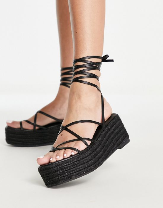 https://images.asos-media.com/products/glamorous-strappy-espadrille-flatform-in-black/201573713-3?$n_550w$&wid=550&fit=constrain