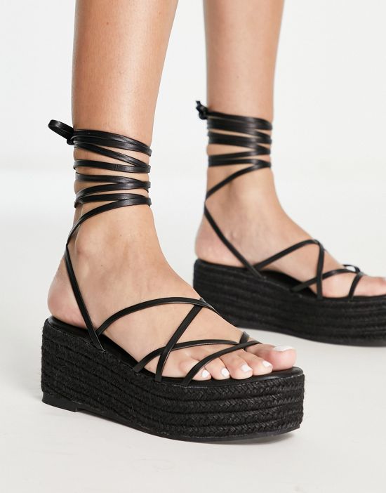 https://images.asos-media.com/products/glamorous-strappy-espadrille-flatform-in-black/201573713-4?$n_550w$&wid=550&fit=constrain