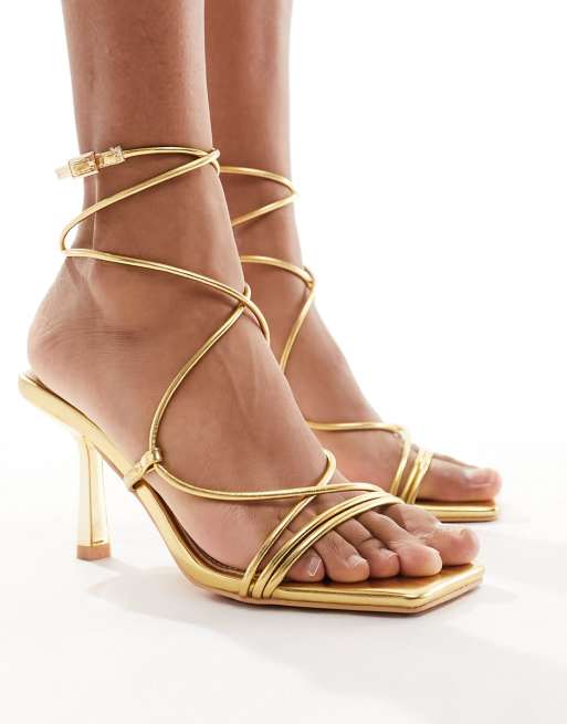 Glamorous strappy heeled sandals in gold