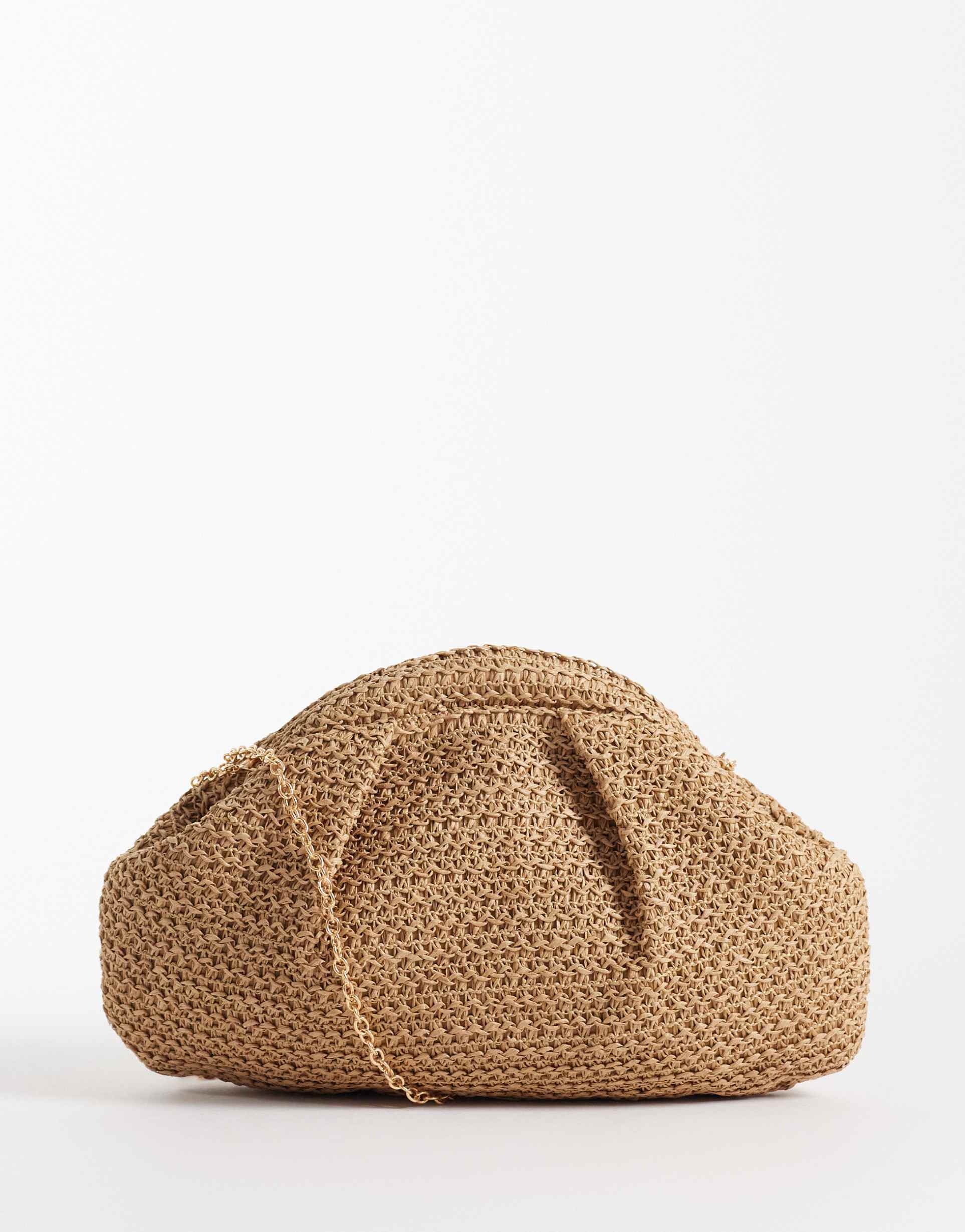 glamorous straw pillow clutch purse in neutral