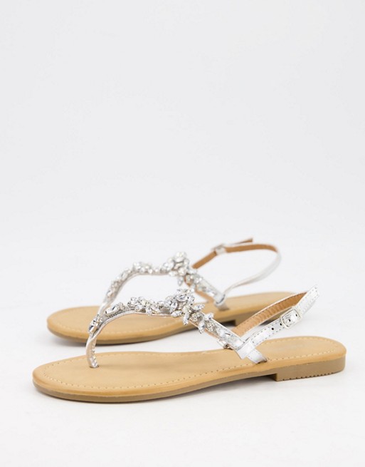 Glamorous toe post flat sandals with embellishments in silver