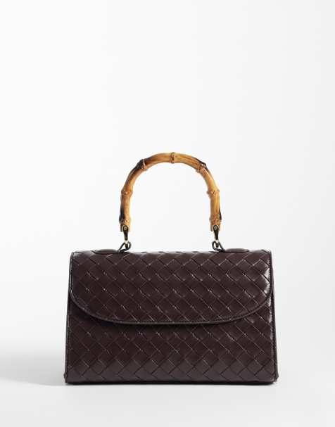 Glamorous top handle bag in brown weave - view 1