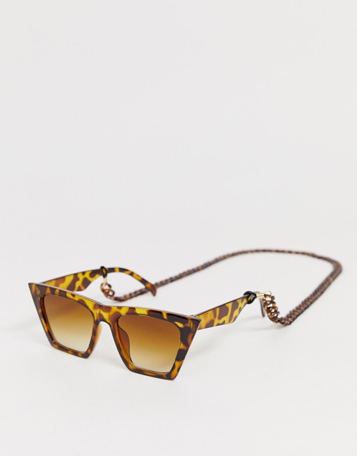 Glamorous tortoiseshell oversized sunglasses with plastic chain
