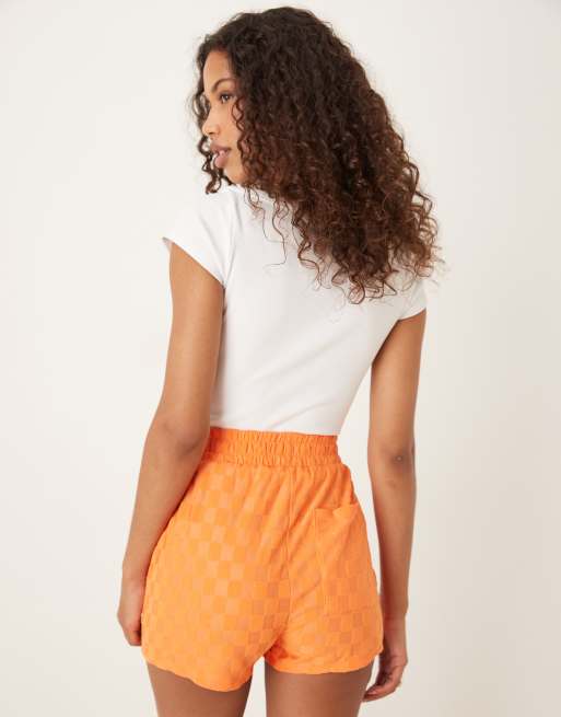 Glamorous Track shorts with back patch pocket in orange checkerboard, 2 of 5