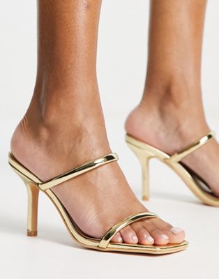 two strap mule heeled sandals in gold