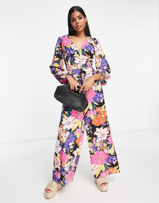 ASOS DESIGN bubble crepe button back long sleeve jumpsuit in floral print