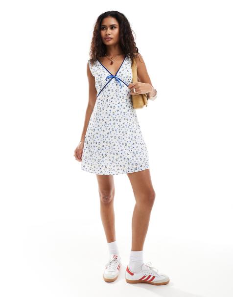 Glamorous v neck mini flippy dress in blue ditsy with velvet ribbon trim - view 1