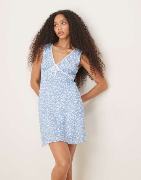 Glamorous v neck mini flippy dress in blue ditsy with velvet trim ribbon - view 1