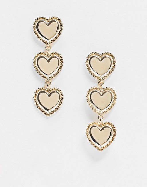 Glamorous heart tierred earrings in gold
