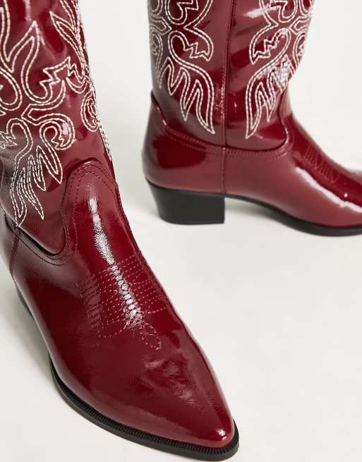 Glamorous western boots in dark red