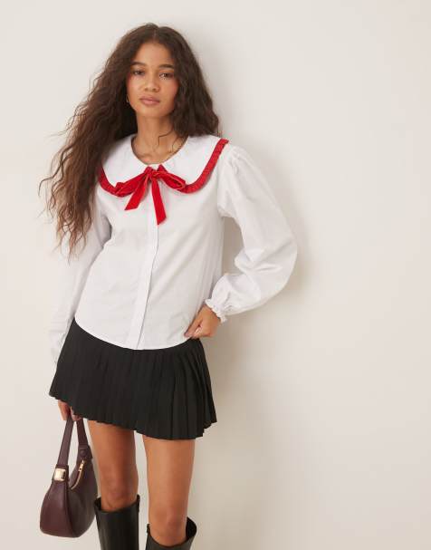 Glamorous white blouse with red tipping and bow - view 1